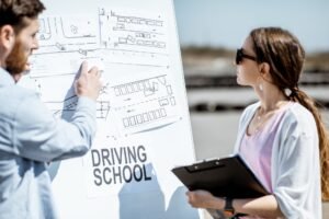 Mitcham Driving School instructor showing traffic routes to a learner across the eastern Melbourne service area