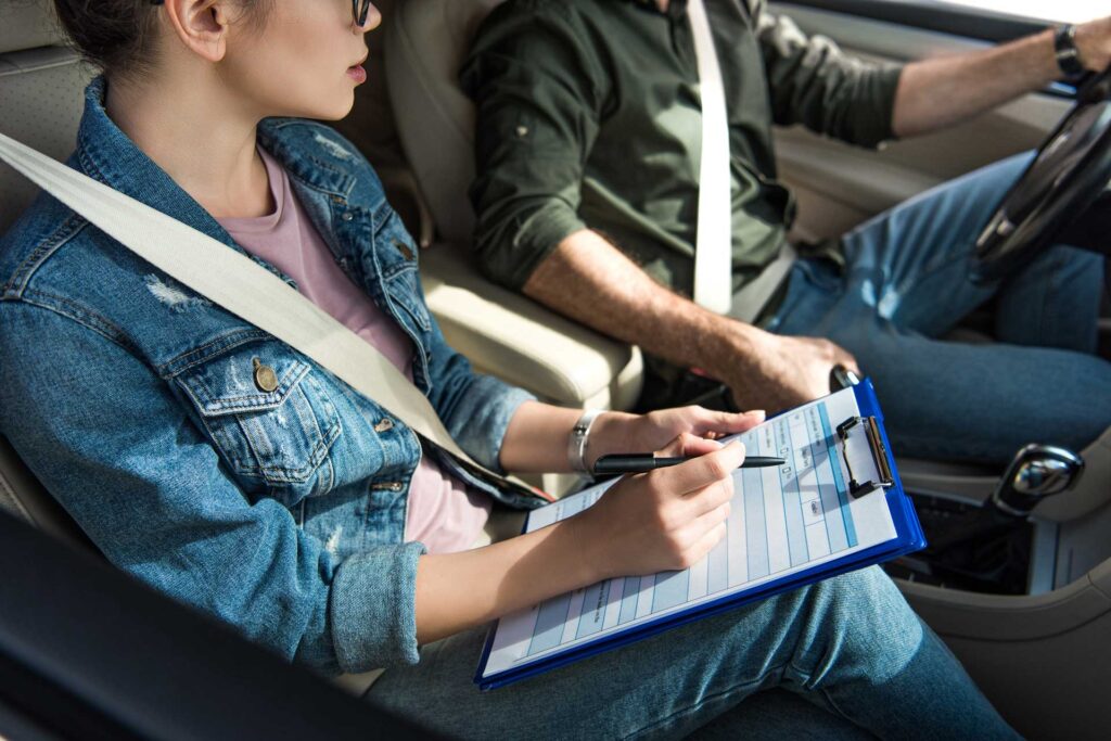 Driving instructor guiding a learner during a lesson at Mitcham Driving School